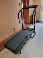 Full view of Weslo Cadence 927 treadmill with handrails and belt