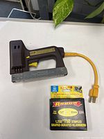 Arrow electric stapler with power cord and box of staples