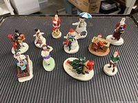 Top view of all eleven Sebastian Miniatures figurines arranged on tray