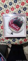 Front view of packaged Coca-Cola night light