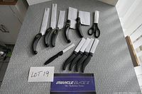 Full view of entire Miracle Blade III set laid out on table