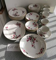 Full dinner set laid out showing pattern, stack counts and overall condition