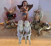 group shot of six angel and cherub figurines