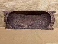 Top view showing entire interior of wooden dough bowl