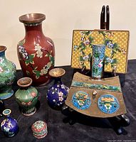 Group overview showing vases, trinket boxes, fan ash receiver