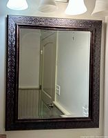 Full view of mirror showing frame and glass
