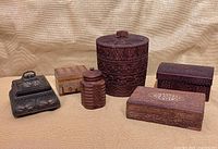 All six lidded boxes grouped for size and style reference