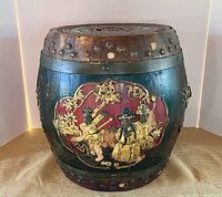 Full view of barrel showing relief panel, metal bands, lid