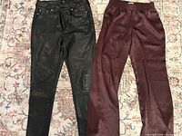 Both pants side by side for style, color and condition overview