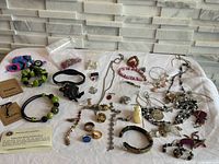 Overview of all jewellery pieces laid out on table