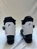 rear view of both boots showing white cuffs and Head logos