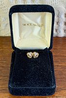 Pair of diamond heart earrings in open 14 KT GOLD stamped box