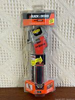 Front view of sealed Black & Decker AutoWrench in package