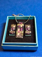Pendant and earrings set in presentation box