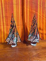 Pair of glass Christmas trees front view