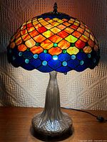 Lamp illuminated showing colour pattern and base