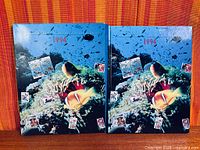 Book and matching slipcase front covers