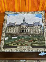 Full view of tapestry showing château and gardens