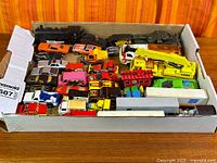 Full box of assorted die-cast vehicles
