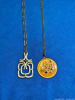 Front view of both pendant necklaces