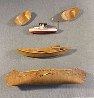 All five miniature boats laid out for overview