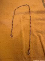 Full view of 14K gold watch chain showing spring ring and swivel ends