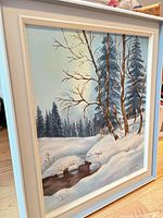 Full view of framed painting showing artwork and frame