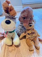 Group shot of Odie dog, platypus, and Hard Rock Cafe bear