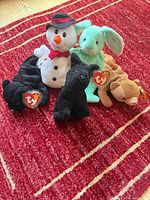 Group image of five Ty Beanie Babies plush toys