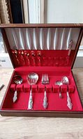 Open case showing full utensil set
