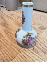 Full view of vase front with transfer scene and gilt rim