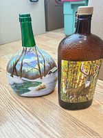 Front view of both painted bottles