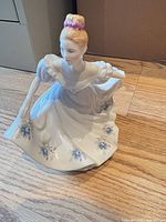 Front view of Kathy figurine showing dress details and pose