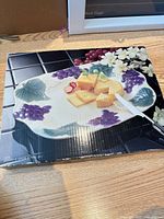 Front of retail box showing platter design and size