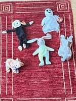 Group shot of five Ty Beanie Babies on red carpet