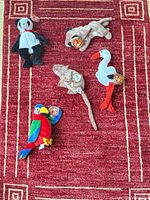 Group shot of all five Ty Beanie Babies on red rug