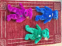 All three bears laid out showing colours, shape and size