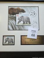 Framed bear $8 stamp display with plaque and cancellation