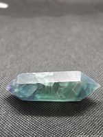 Side view of polished fluorite double point