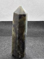 Front view of labradorite tower showing pointed tip and faceted sides