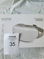 Front of sealed Renpho RF-EM001 eye massager retail box