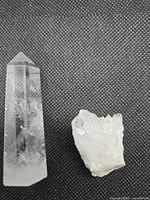 Quartz point and cluster side-by-side