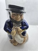 Front view of ceramic sailor boy toby jug