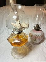 Both lamps side by side showing overall form and chimneys