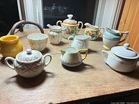 Overview of all tea set pieces on table