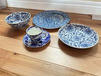 Group shot of all six blue and white china and ceramic pieces
