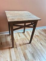 Full frontal view of square wood table