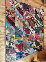 Full view of silk necktie quilt showing overall pattern and size
