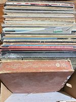 Top view of box showing spines of numerous LP records and boxed set