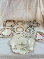 Group shot of all eight porcelain pieces laid out